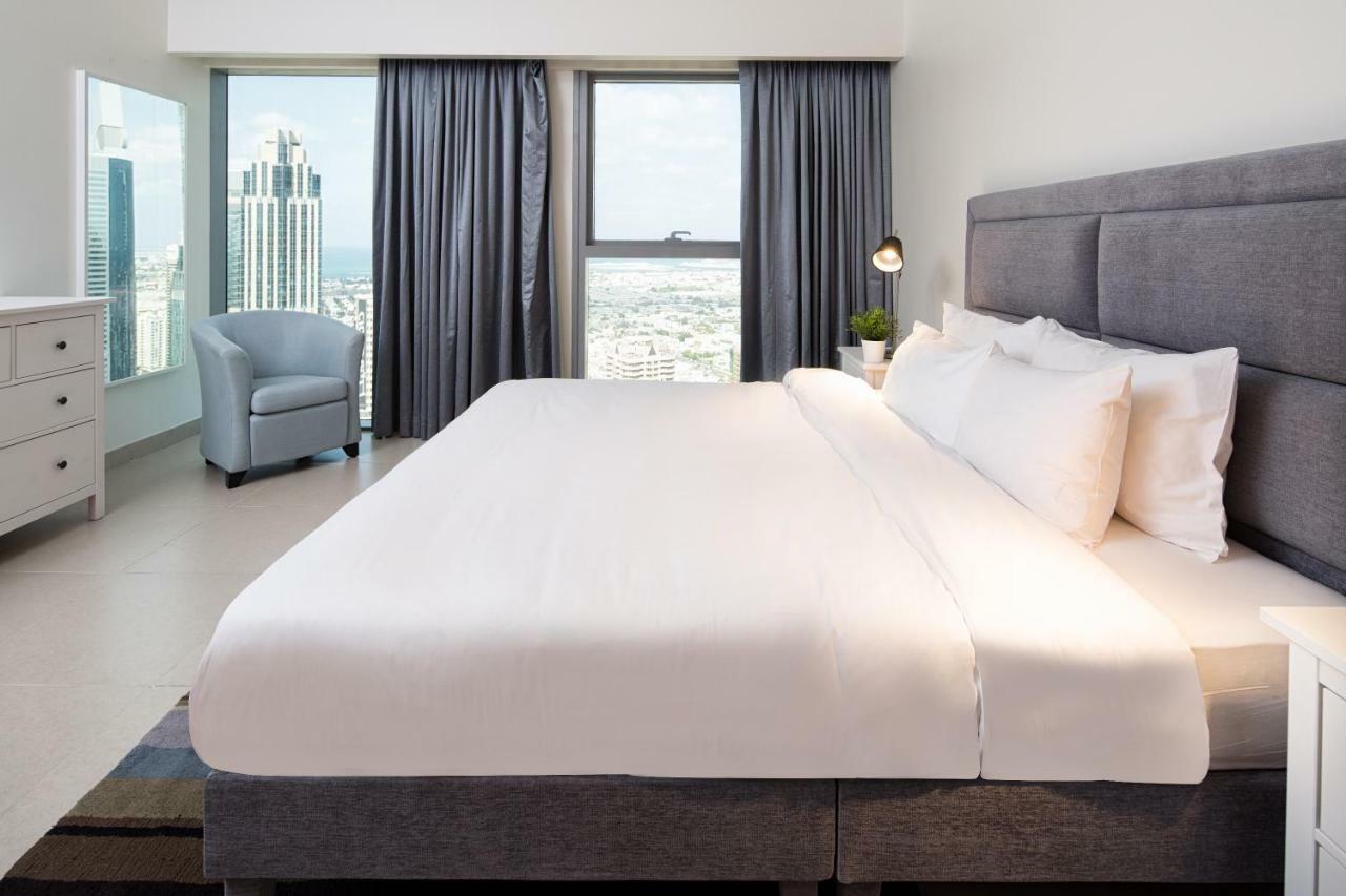 Nasma Luxury Stays - Central Park Tower Дубай Экстерьер фото